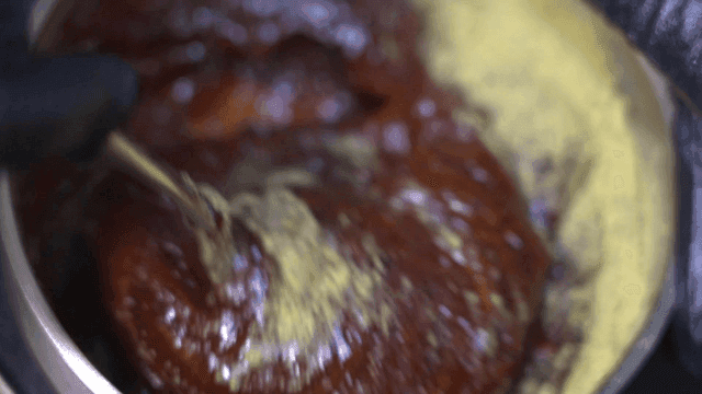 Stirring rich gochujang sauce