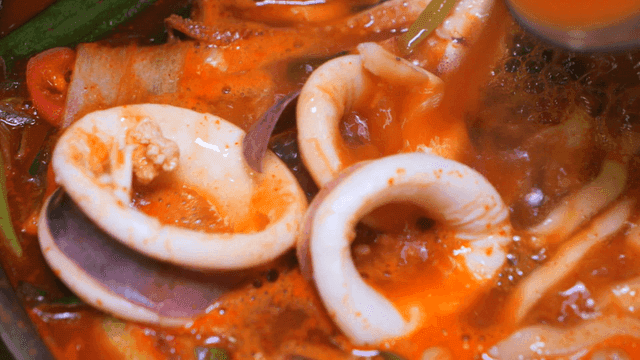 Spicy kalguksu with squid