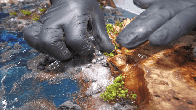 Miniature resin art with rocks and moss