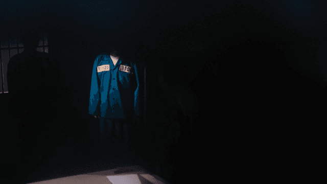 Prisoners and detectives in dark room