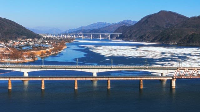 Bridges over the Frozen River during Winter