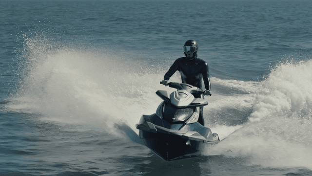 Person riding a jet ski on the ocean