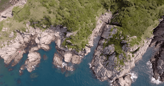 Rocky coastline with clear blue water