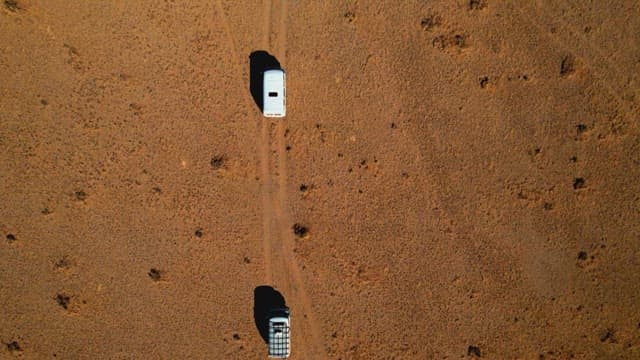 Vehicle Driving in a Barren and Vast Desert