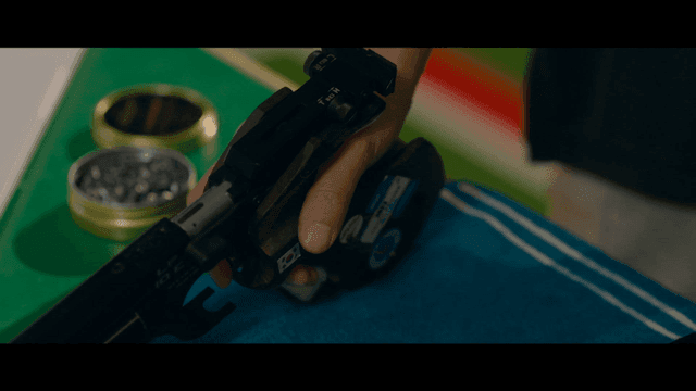 Person holding sports pistol