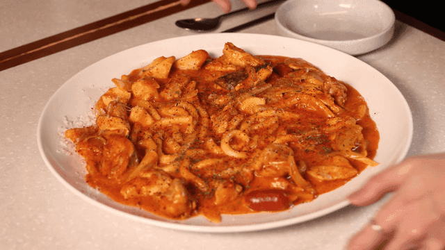 Spicy Rosé Braised Chicken on Table
