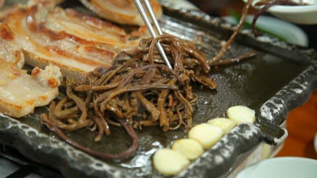 Grilled Pork and Bracken on a Hot Stone Plate