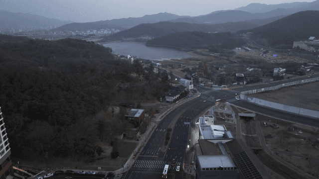 Aerial view of a city with surrounding nature