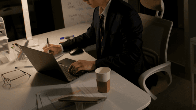 Person working late at a desk