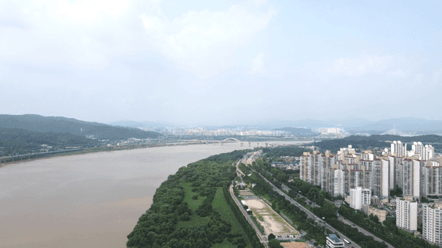 Cityscape with rivers and mountains