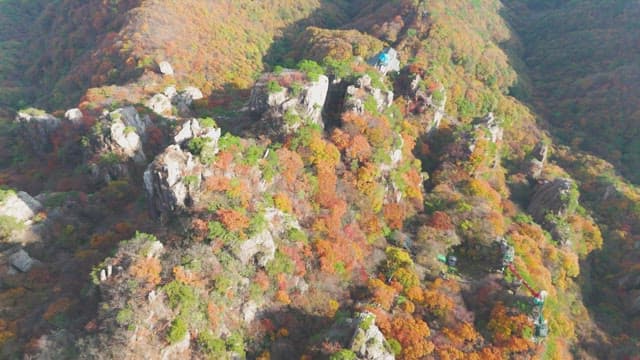 Colorful autumn mountains with rocky peaks