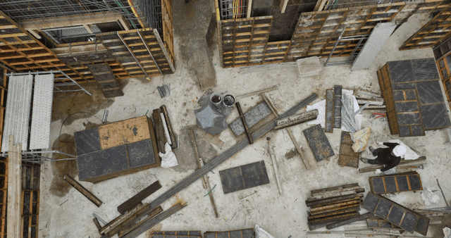 Construction site with scaffolding and worker