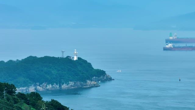 Coastal Landscape with Lighthouse and Cable Cars