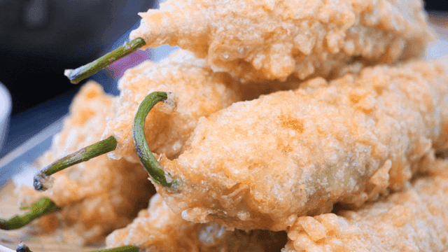 Crispy fried chili peppers on a plate