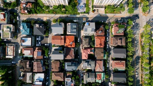 Colorful housing complex with lots of trees