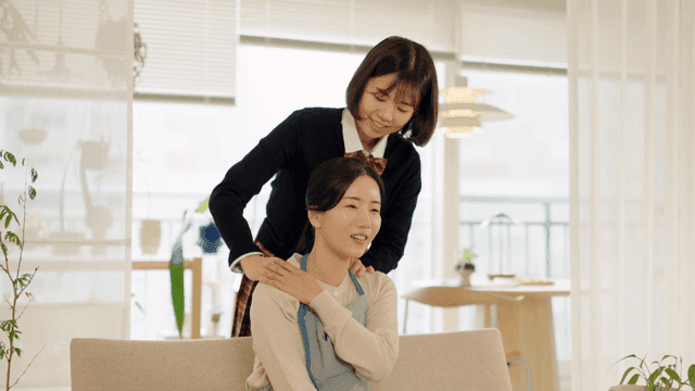 A woman giving a massage to her friend