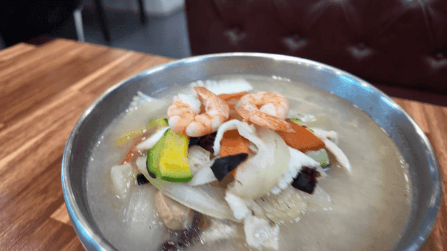 White Jjamppong Soft Tofu on table