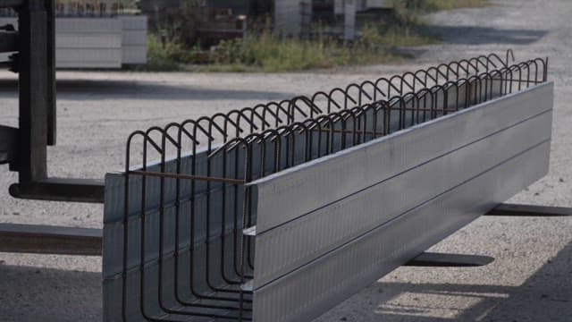 Metal beams stacked on a construction site