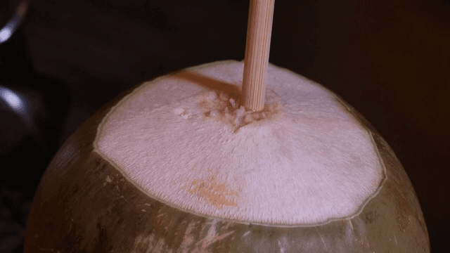 Coconut drink with straw