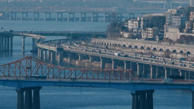 A bustling city bridge with flowing traffic