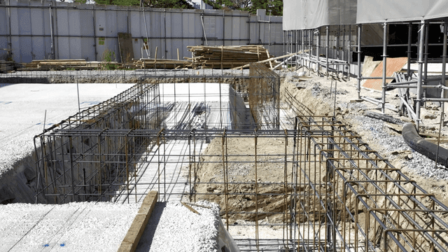 Construction site with steel frames and materials