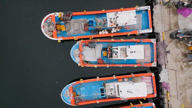 Fishing boats docked at the harbor