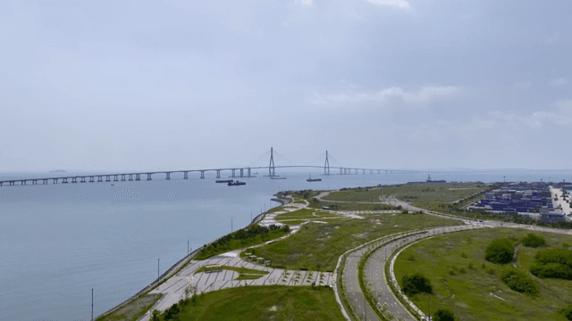 A long bridge over a calm sea