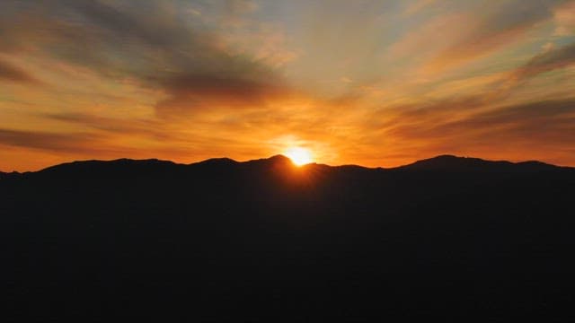 Serene Sunrise Over the Mountain Range