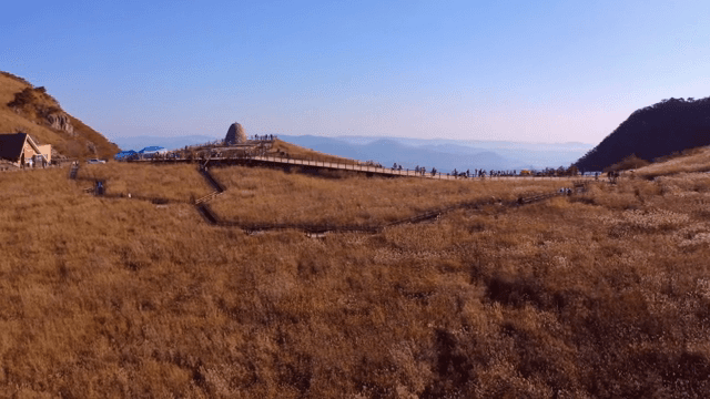 Mountain trail with people hiking