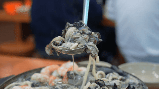 Seafood noodle soup with fresh shellfish