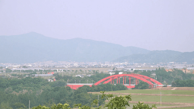 Red bridge in countryside