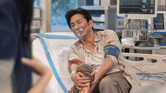 Male patient with leg injury in emergency room ward
