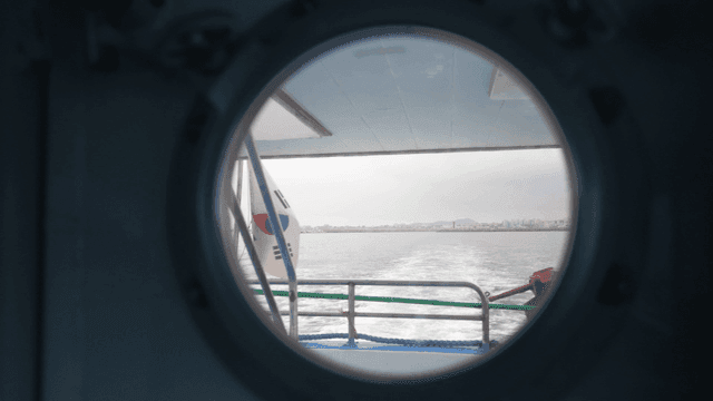 View from a ship's porthole at sea