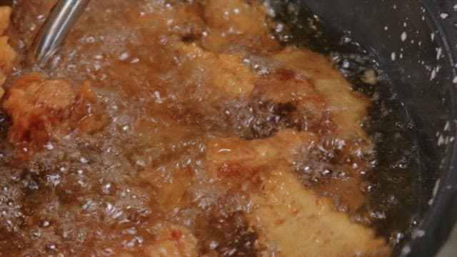 Frying food in boiling hot oil