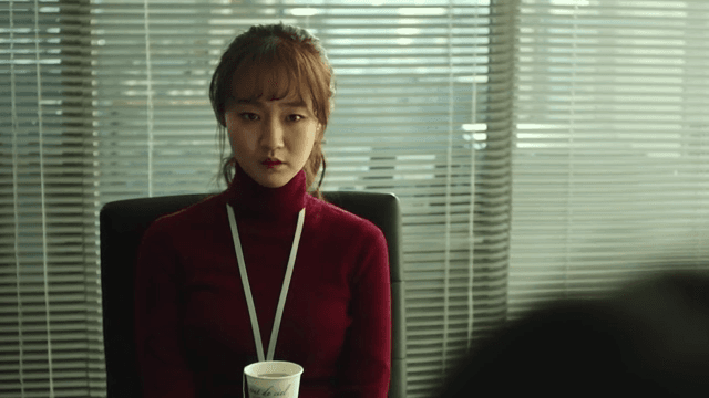 Woman speaking in conference room