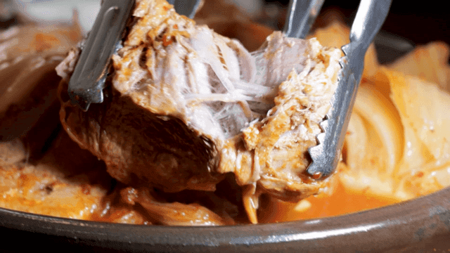 Kimchi stew with tender pork that tears apart with tongs