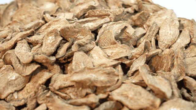 Dried medicinal herbs in a bowl