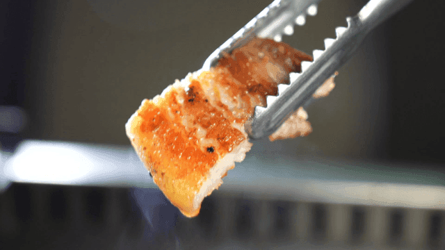 Crispy pork belly grilled on barbecue