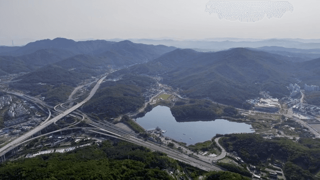 Aerial view of a city with mountains