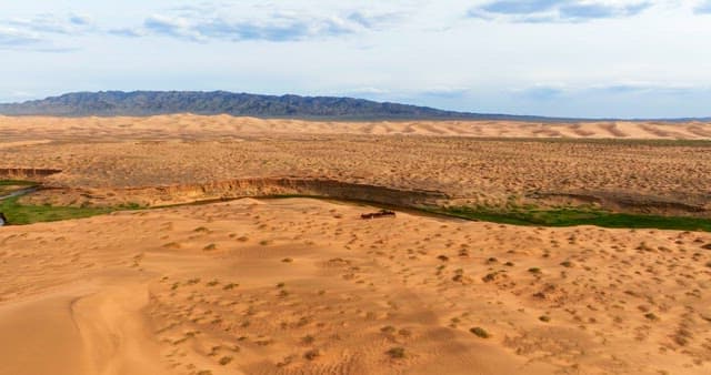 Desert with green valleys