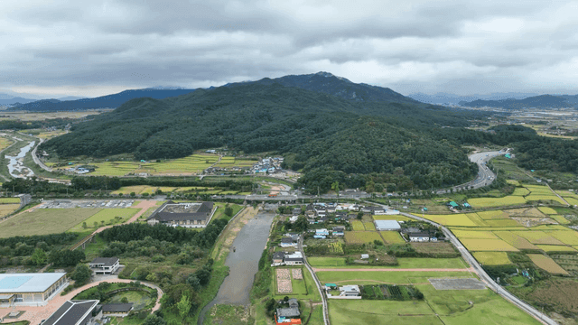 Aerial view of rural farmland and village