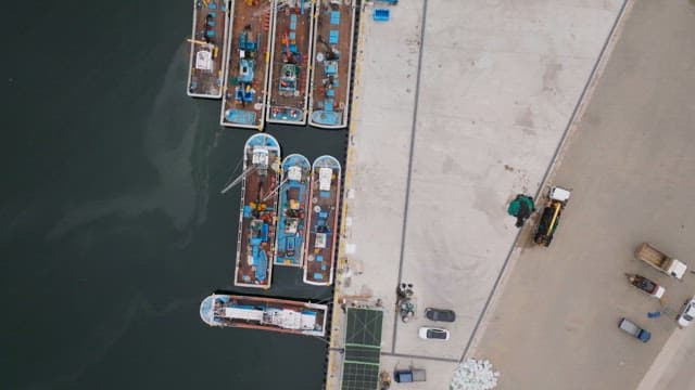Fishing boats docked at the harbor