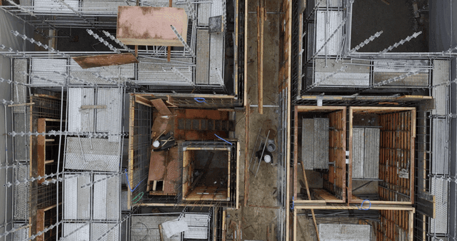 Construction site with scaffolding and workers