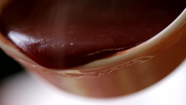 Red bean porridge poured over steamed buns