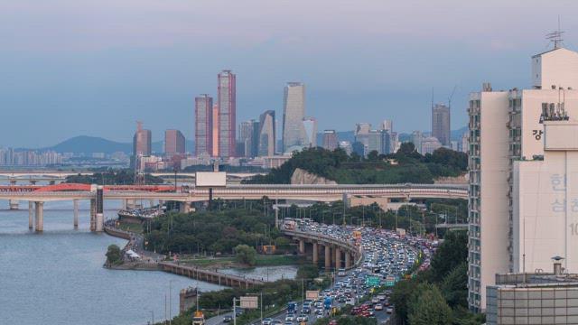 Busy Riverside Road from Morning to Night