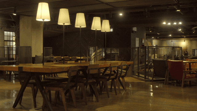 Cozy cafe with wooden tables and chairs