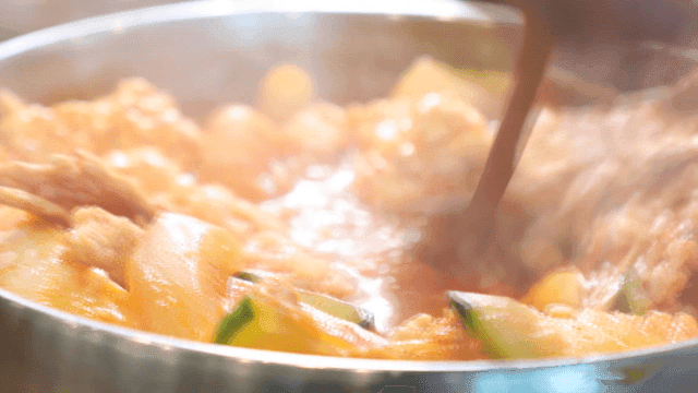 Jjamppong soft tofu mixed with rice and eaten with spoon