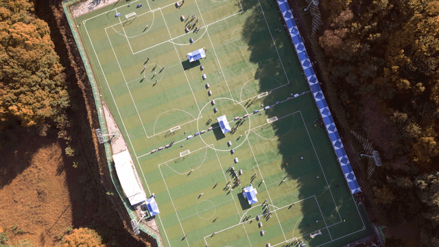Aerial view of soccer field with people