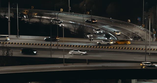 Busy highway bridges at nighttime