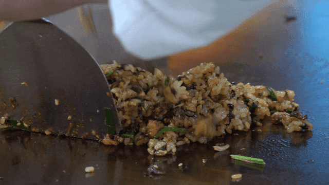 Fried rice cooked on hot iron plate